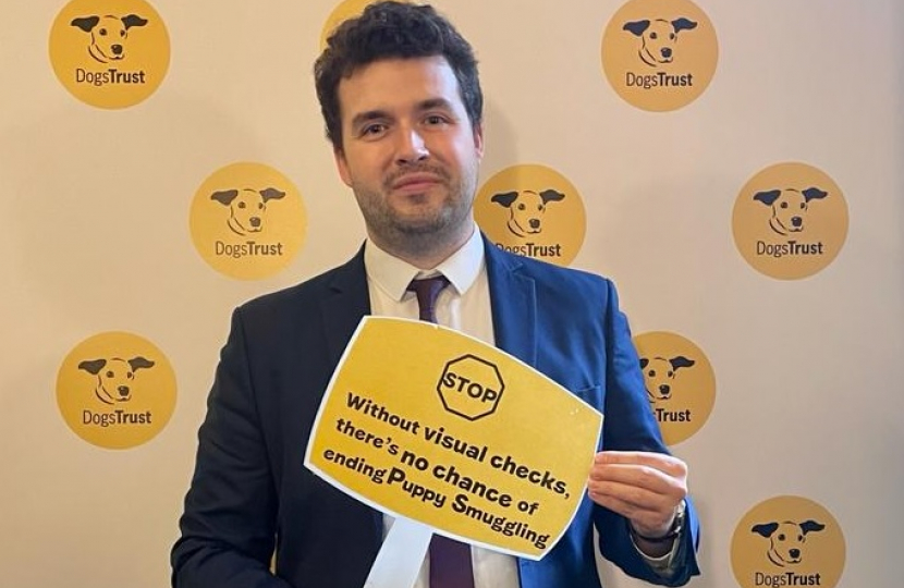 Elliot showing support for the Dogs Trust's anti-puppy smuggling campaign