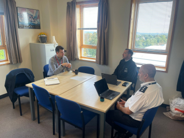 Elliot meeting with senior police officers